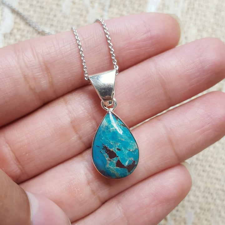 Arizona Turquoise and Inlaid Jewelry Teardrop Inlaid Turquoise Pendant