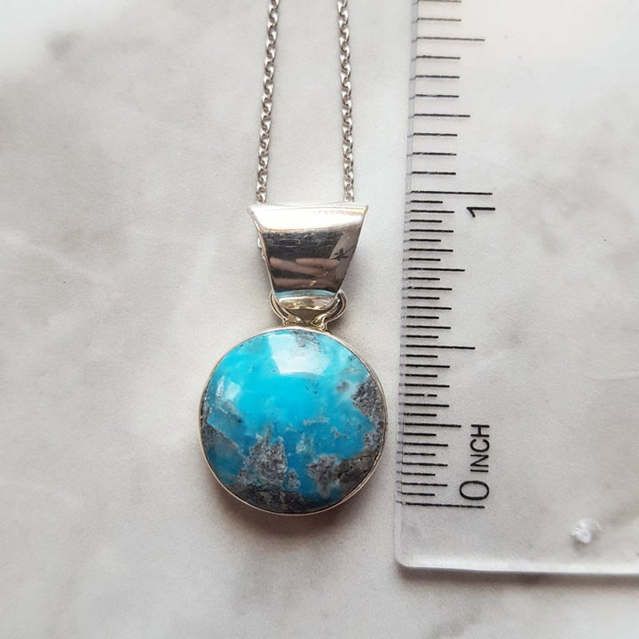 Arizona Turquoise and Inlaid Jewelry Round Arizona Turquoise Pendant