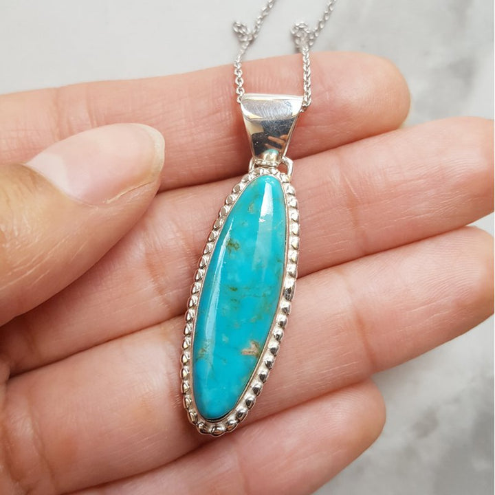 Arizona Turquoise and Inlaid Jewelry Long Oval Kingman Turquoise Pendant