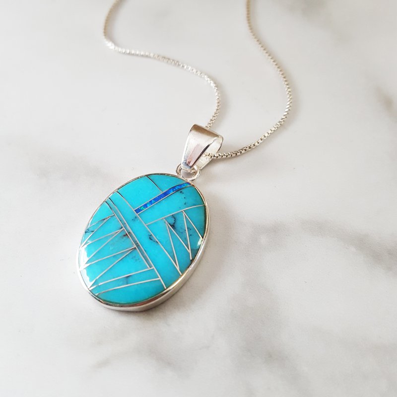 Arizona Turquoise and Inlaid Jewelry Oval Sonoran Pendant