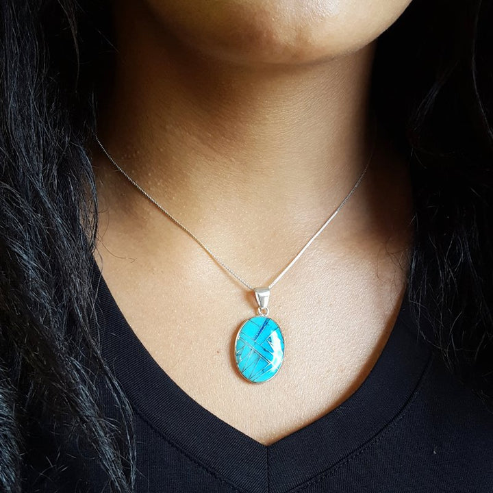 Arizona Turquoise and Inlaid Jewelry Oval Sonoran Pendant