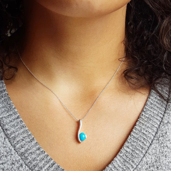 Arizona Turquoise and Inlaid Jewelry Oval Turquoise Swoop Pendant