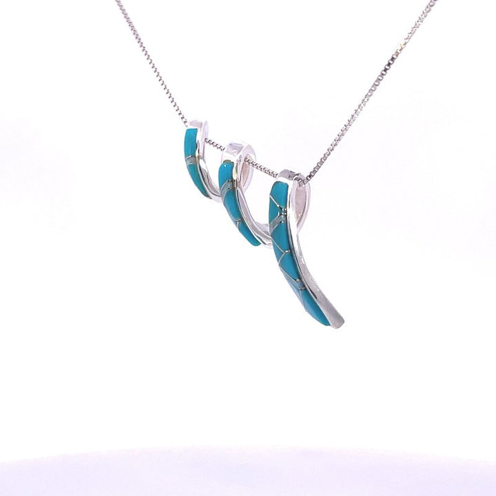 Arizona Turquoise and Inlaid Jewelry Turquoise and Opal Inlaid Spiral Pendant