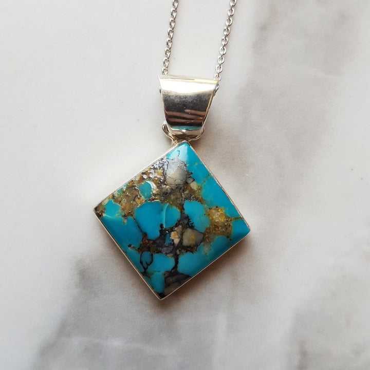 Arizona Turquoise and Inlaid Jewelry Geometrically Inlaid Kingman Vintage Pendant